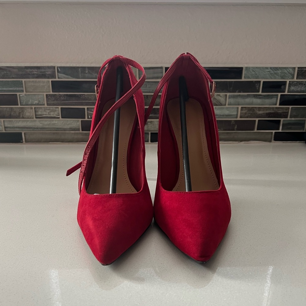 Red heels with gold accents